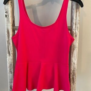 Pink peplum top from Express. NWT 🤩